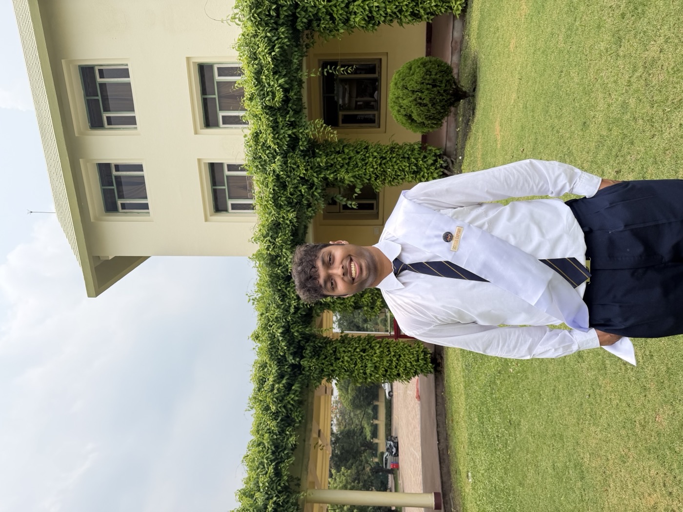 Me in school uniform on the Heritage School lawn